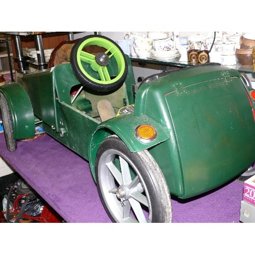 150 - BATTERY POWERED CHILD SPORTS CAR IN BRITISH RACING GREEN, RETRO STYLE.