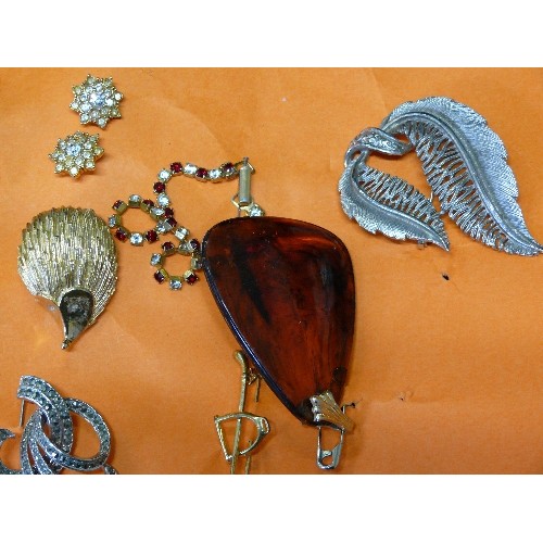 26 - A CARD OF COSTUME JEWELLERY.