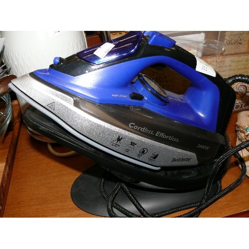 313 - A BELDRAY STEAM IRON  WITH STAND.