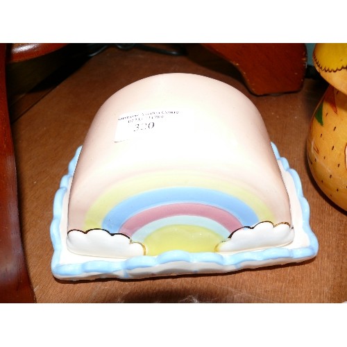 320 - A RAINBOW THEMED BUTTER DISH, A WOODEN TOADSTOOL AND A PAIR OF DUCKS.