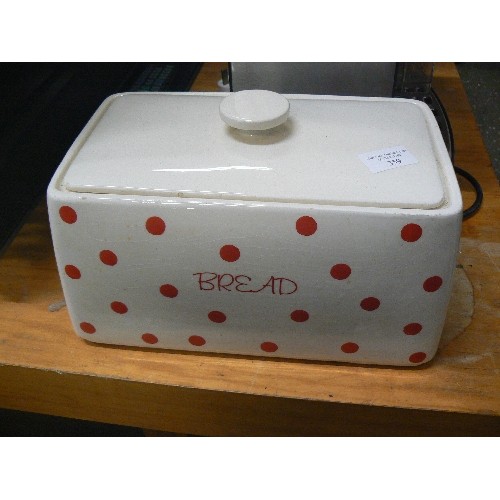 359 - A RED SPOTTY CERAMIC  BREAD BIN.