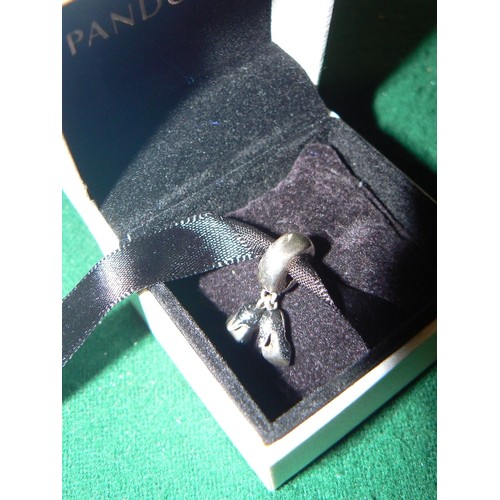 22 - A BOXED PANDORA CHARM  WITH SHOE DETAIL MARKED 925.