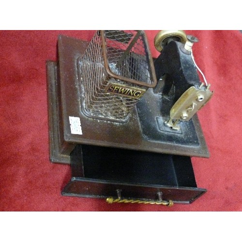 89 - MINIATURE SEWING MACHINE ON RAISED PLINTH WITH DRAWER.