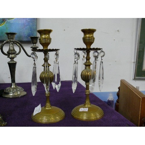 132 - A SILVER PLATE CANDLEBRA, A BRASS AND ONYX FIGURE CANDLESTICK, A PAIR OF BRASS CANDLESTICKS  WITH GL... 