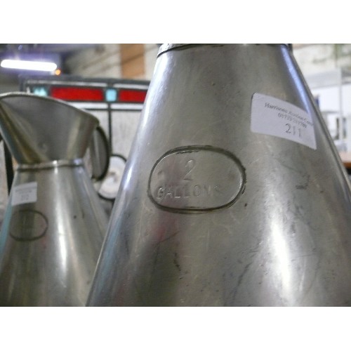 211 - TWO GALLON STAINLESS STEEL JUG.