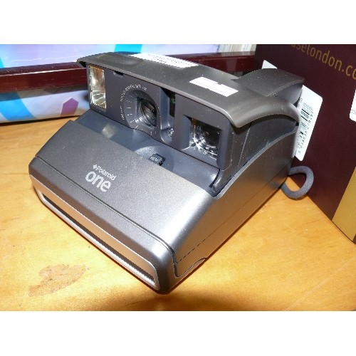 344 - A POLAROID ONE CAMERA.