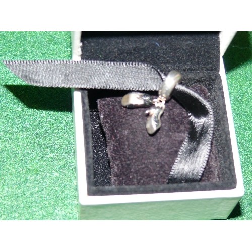 22 - A BOXED PANDORA CHARM  WITH SHOE DETAIL MARKED 925.