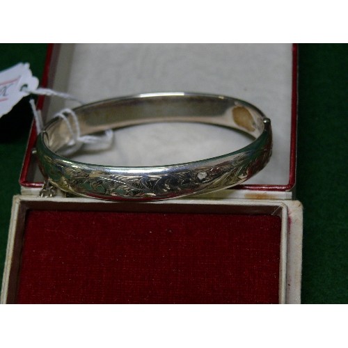 38 - HALLMARKED SILVER ENGRAVED BANGLE WITH SAFETY CHAIN.