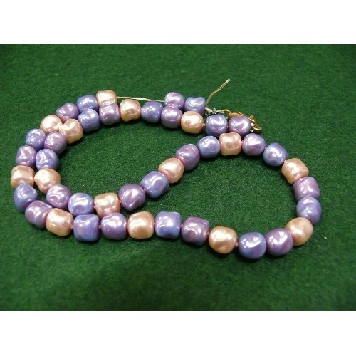 8 - PRINCESS PEARL NECKLACE.  PEARLS ARE COLOURED MAUVE, LIGHT BLUE AND CREAM.