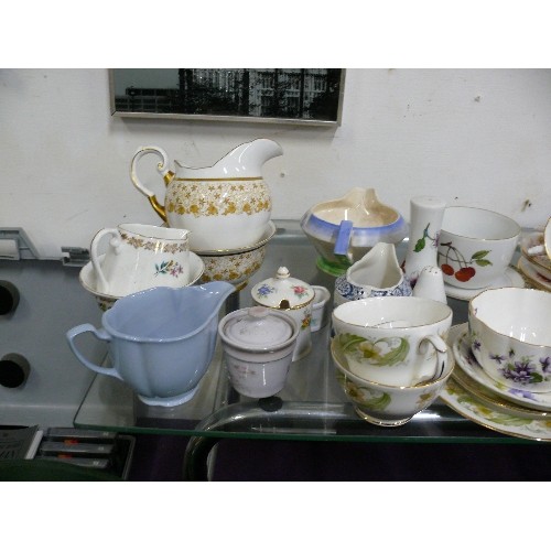 151 - A TABLETOP OF MIXED VINTAGE CHINA.