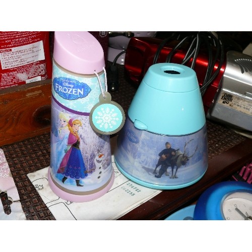 297 - DISNEY FROZEN PROJECTOR LAMP, A NIGHTBEAM TILT TORCH AND TWO STATIONERY SETS.