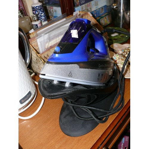 313 - A BELDRAY STEAM IRON  WITH STAND.