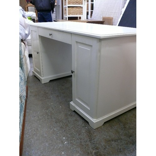 399 - WHITE DRESSING TABLE/DESK WITH CUPBOARD EITHER SIDE AND CENTRAL DRAWER.