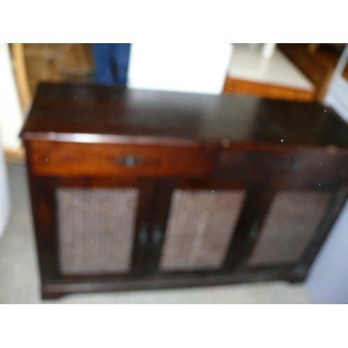 406 - DARK WOOD SIDEBOARD WITH THREE  CUPBOARDS WITH RATTAN PANELS.