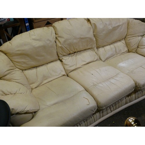 435 - CREAM LEATHER THREE SEATER SOFA.