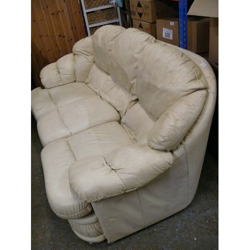 435 - CREAM LEATHER THREE SEATER SOFA.