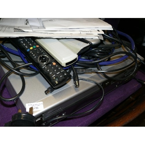 196 - A DAEWOO DVD RECORDER AND VCR DF-4150P PLUS A SELECTION OF LEADS AND REMOTE CONTROLS.