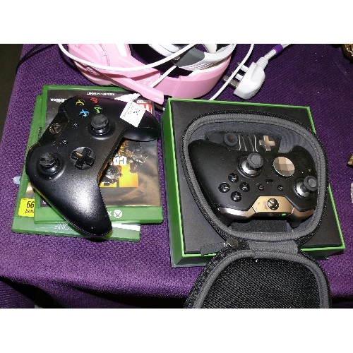 202 - TWO WIRELESS CONTROLLERS FOR AN XBOX, ONE WITH ORIGINAL BOX AND CASE.