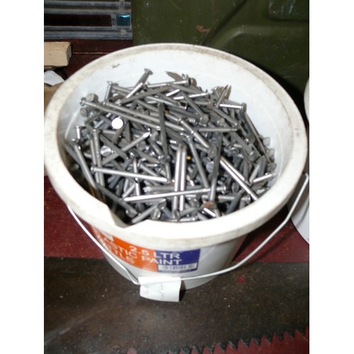 299 - FOUR TUBS OF NAILS AND RAWLBOLTS.