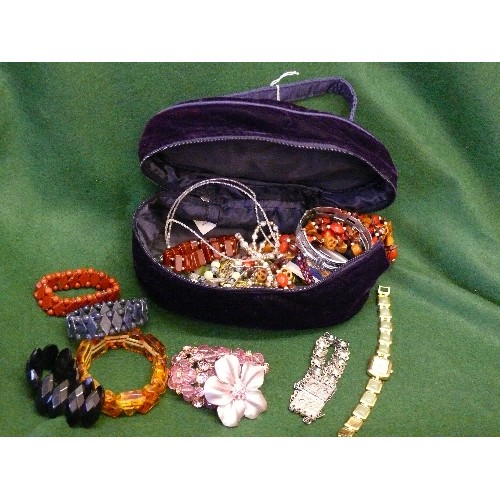 38 - VELVET JEWELLERY BAG WITH LOTS OF HIGH END DESIGNER JEWELLERY INSIDE.