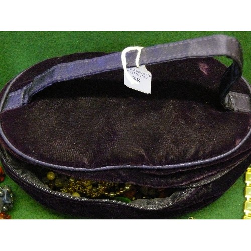 38 - VELVET JEWELLERY BAG WITH LOTS OF HIGH END DESIGNER JEWELLERY INSIDE.