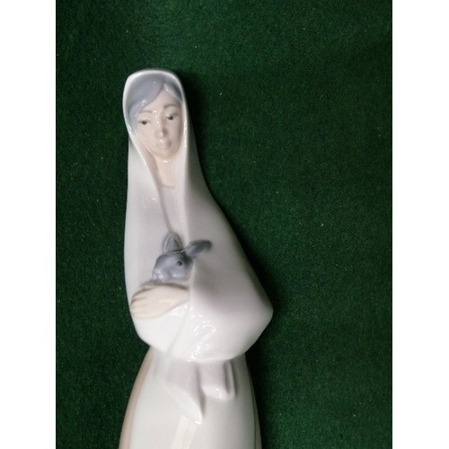 6 - NAO FIGURE OF A LADY HOLDING A RABBIT.