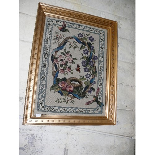 387 - A LARGE FRAMED TAPESTRY PICTURE.