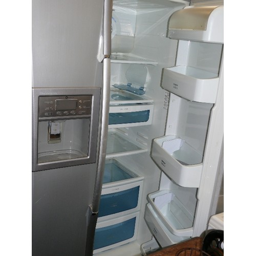 410 - DAEWOO AMERICAN DOUBLE DOOR FRIDGE FREEZER IN SILVER/GREY.  MODEL NUMBER FRS-2031LAL.  ICE AND WATER... 