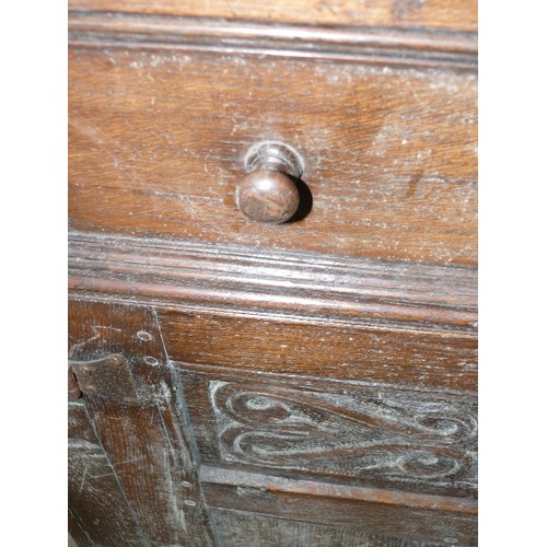 424 - SOLID OAK, CARVED SIDEBOARD WITH THREE DRAWERS AND THREE CUPBOARDS.