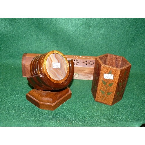 68 - A DECORATIVE WOODEN INCENSE BOX, A WOODEN VASE WITH DECORATIVE BRASS INLAY AND A SET OF WOODEN COAST... 