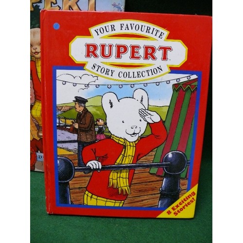 115 - FOUR VINTAGE RUPERT CHILDREN'S BOOKS.