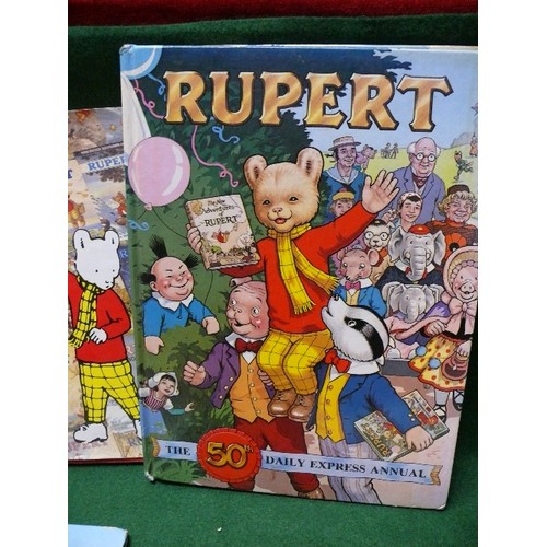 115 - FOUR VINTAGE RUPERT CHILDREN'S BOOKS.