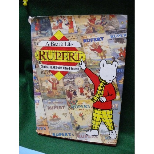 115 - FOUR VINTAGE RUPERT CHILDREN'S BOOKS.