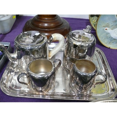 137 - CHROME FOUR PIECE TEASET AND TRAY.