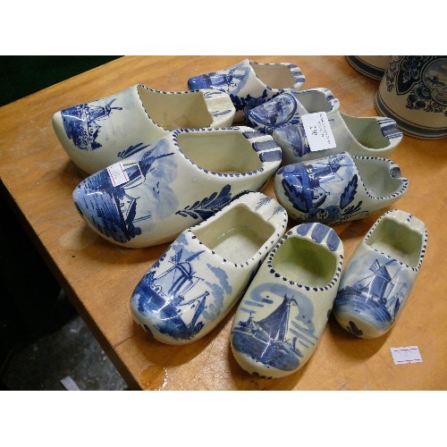 230 - A COLLECTION OF DELFTWARE SHOES/CLOGS.