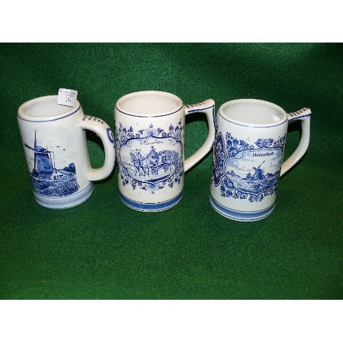 231 - A COLLECTION OF DELFTWARE TANKARDS.