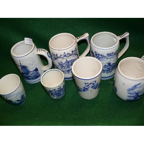 231 - A COLLECTION OF DELFTWARE TANKARDS.