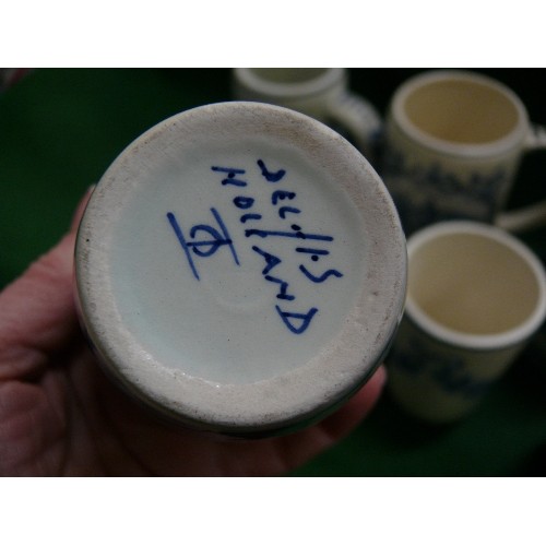 231 - A COLLECTION OF DELFTWARE TANKARDS.