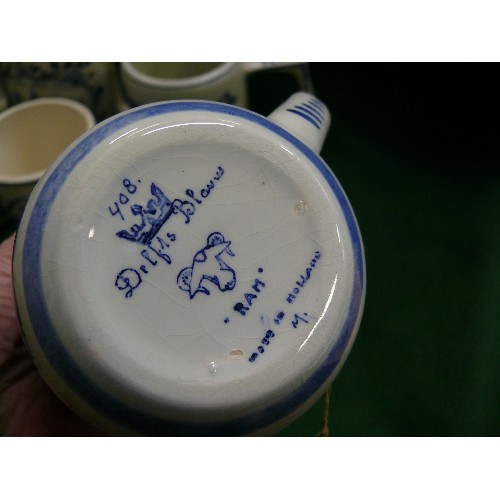 231 - A COLLECTION OF DELFTWARE TANKARDS.