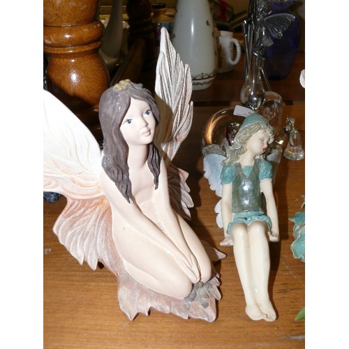 253 - COLLECTION OF FOUR FAIRY ORNAMENTS.