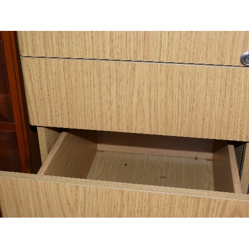 421 - THREE DRAWER FILING CABINET IN LIGHT WOOD EFFECT.