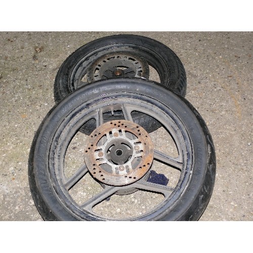 509 - TWO MOTORCYCLE TYRES ON WHEELS IN GOOD CONDITION.