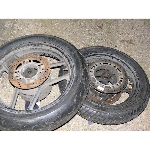 509 - TWO MOTORCYCLE TYRES ON WHEELS IN GOOD CONDITION.