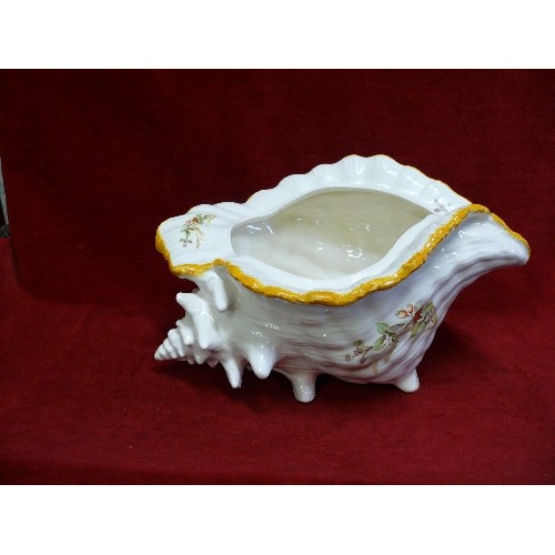 78 - A DECORATIVE CERAMIC CONCH SHELL VASE.