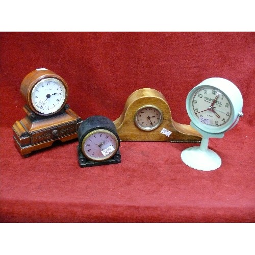 84 - FOUR SMALL DECORATIVE MANTLE CLOCKS.