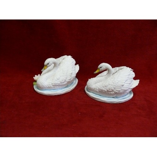 87 - A PAIR OF FINE CHINA SWANS BY ROYAL OSBORNE.