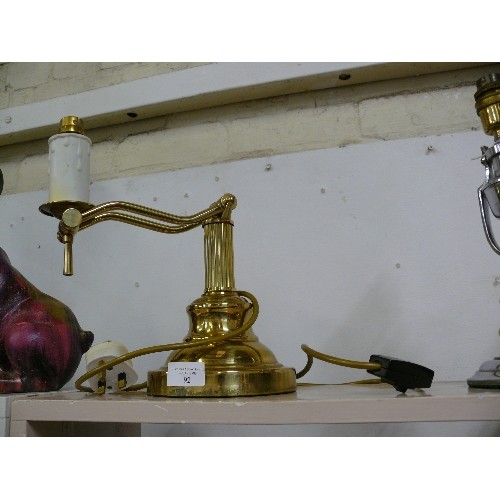 92 - A VINTAGE BRASS DESK LAMP.