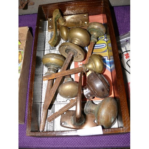 73 - A BOX OF VINTAGE DOOR HANDLES.