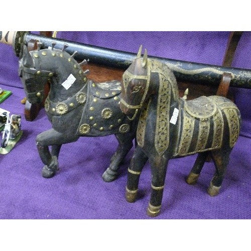 134C - TWO WOOD AND BRASS HORSE FIGURES.