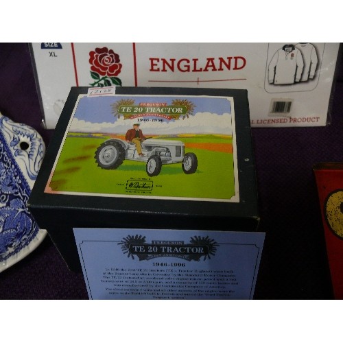 134G - A MODEL OF A FERGUSON TE 20 TRACTOR WITH ORIGINAL BOX.